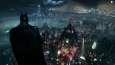 Batmans view of the city of Arkham from one of the high roofs of the city.