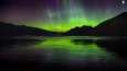 Northern Lights over a mountain lake